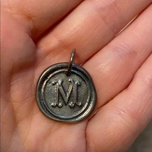 Silver waxing poetic M charm